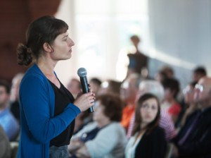 Miller speaking at Brown University, 9/13.